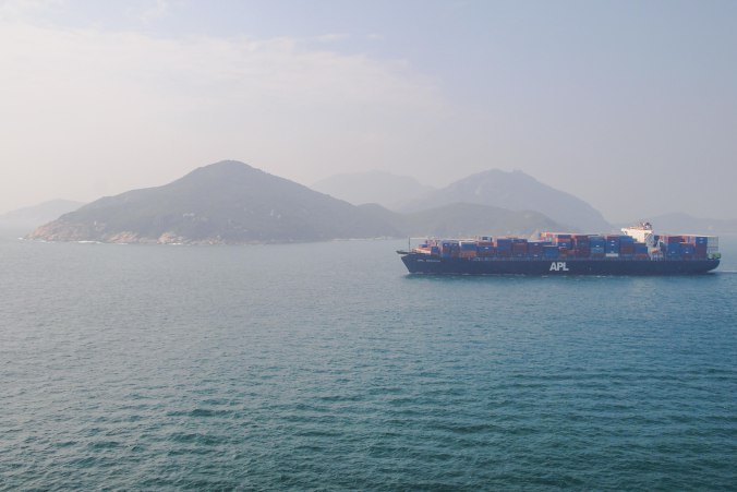 An APL vessel heads out of the port of Hong Kong